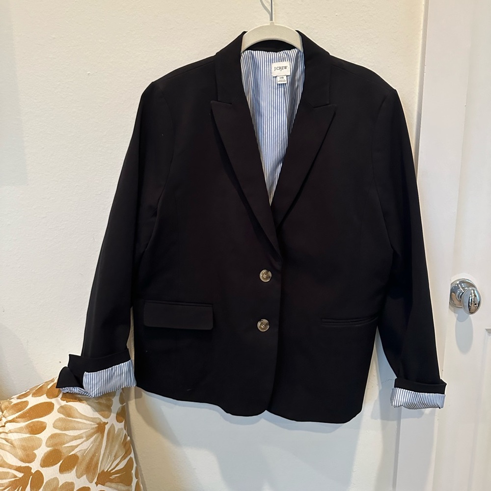 Like new J. Crew black blazer size 16. Pinstripe lining. Excellent condition.
